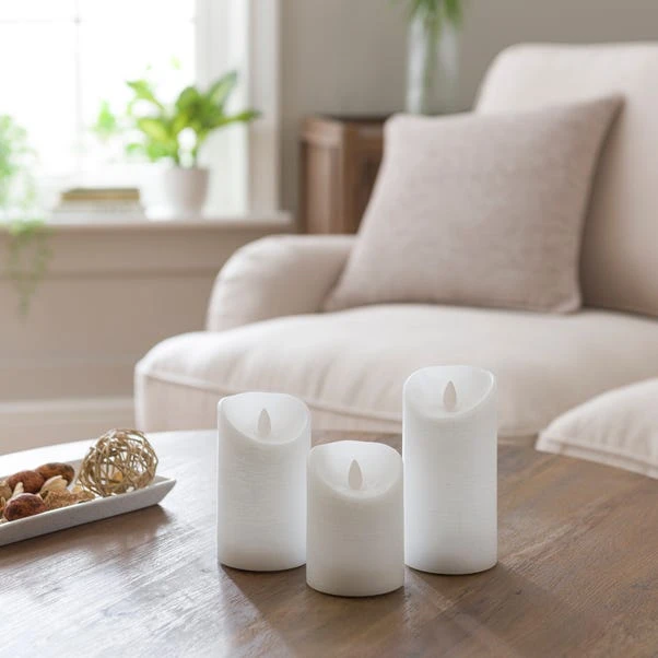 Set Of 3 Amber & Tonka LED Pillar Candles - Image 2